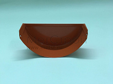 Заглушка на водосточную систему с полимерным 
покрытием оранжевого цвета RAL 2004 для желоба диаметром 125 мм, толщина оцинкованной стали 0,5 мм.